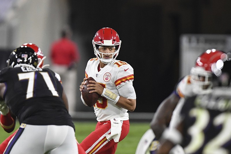 Kansas City Chiefs quarterback Patrick Mahomes (15) looks to pass during the first half of an NFL football game against the Baltimore Ravens, Monday, Sept. 28, 2020, in Baltimore. (AP Photo/Terrance Williams)