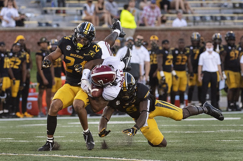 AP photo by L.G. Patterson / Alabama junior receiver Jaylen Waddle hauls in a catch between Missouri defenders Tyree Gillespie, right, and Ishmael Burdine during the Crimson Tide's 38-19 win last Saturday night.