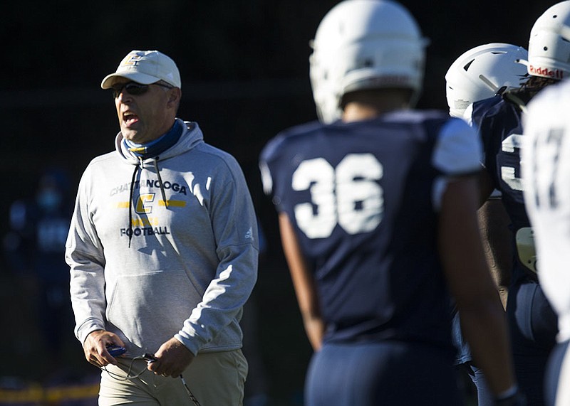 Staff photo by Troy Stolt / UTC football coach Rusty Wright shouts instructions during a special teams drill as the Mocs practice Wednesday at Scrappy Moore Field.