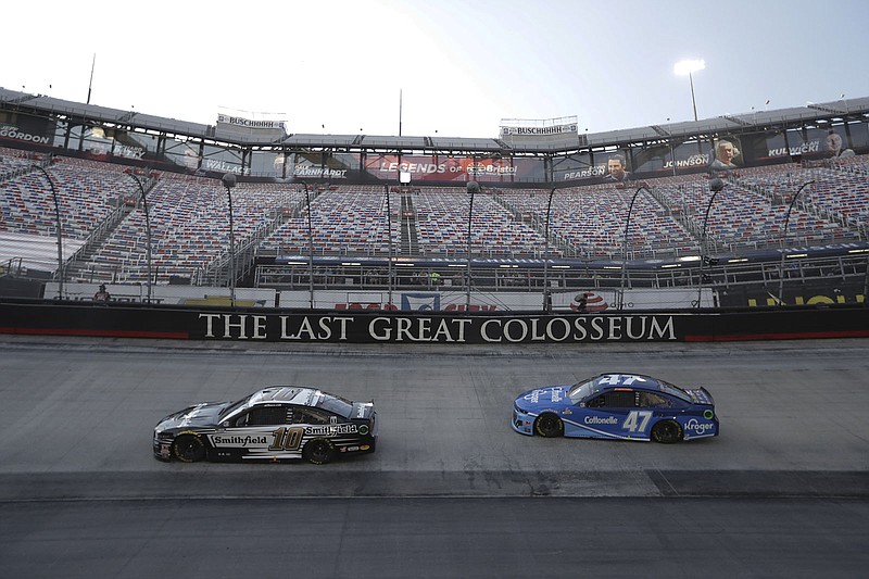 AP photo by Mark Humphrey / Aric Almirola (10) and Ricky Stenhouse Jr. compete during a qualifying event for the NASCAR All-Star Race on July 15 at Bristol Motor Speedway.