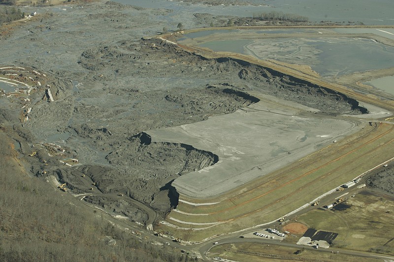 In this Monday, Dec. 29, 2008 file image provided by Greenpeace, coal ash slurry left behind in a containment pond near the Tennessee Valley Authority's Kingston Fossil Plant is shown in Harriman, Tenn., after the dyke at left broke Dec. 22, 2008. (AP Photo/Greeenpeace, Wade Payne)