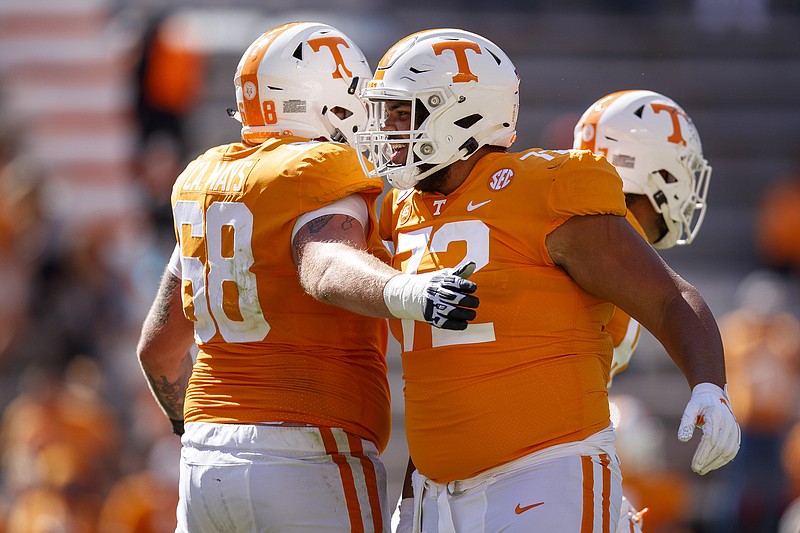 Tennessee Athletics photo by Kate Luffman / Tennessee offensive linemen Cade Mays, left, and Darnell Wright celebrate during Saturday's 35-12 win against Missouri at Neyland Stadium. Mays, who starred at Knoxville Catholic in high school and began his college career with the Georgia Bulldogs, made his Vols debut days after being declared eligibile by the SEC.