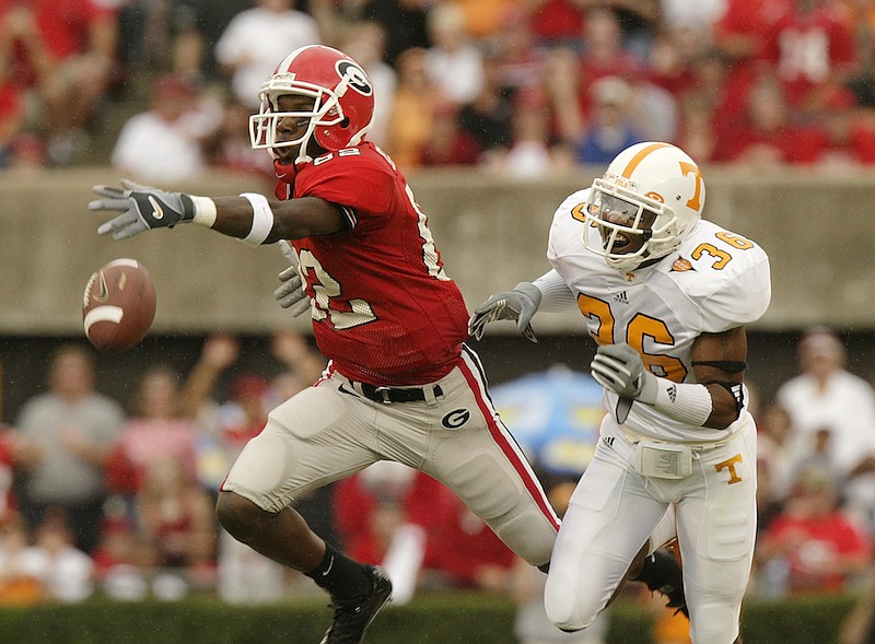 In this 2004 AP file photo, Georgia's Fred Gibson (82) can't reach a pass from quarterback David Greene as Tennessee's Roshaun Fellows (36) defends during the first half of a football game in Athens, Ga. Tennessee won, 19-14. (AP file photo/John Bazemore)
