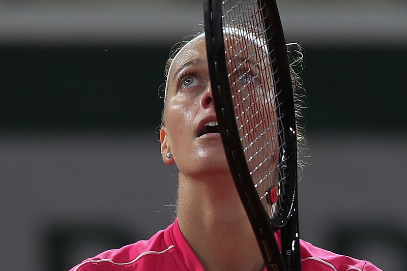 Petra Kvitova of the Czech Republic celebrates winning her fourth round match of the French Open tennis tournament against China's Zhang Shuai in two sets 6-2, 6-4, at the Roland Garros stadium in Paris, France, Monday, Oct. 5, 2020. (AP Photo/Michel Euler)