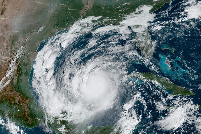 This Wednesday, Oct. 7, 2020 satellite image made available by National Oceanic and Atmospheric Administration shows Hurricane Delta in the Gulf of Mexico at 10:41 a.m. EDT. Delta made landfall Wednesday just south of the Mexican resort of Cancun as an extremely dangerous Category 2 storm. (NOAA via AP)