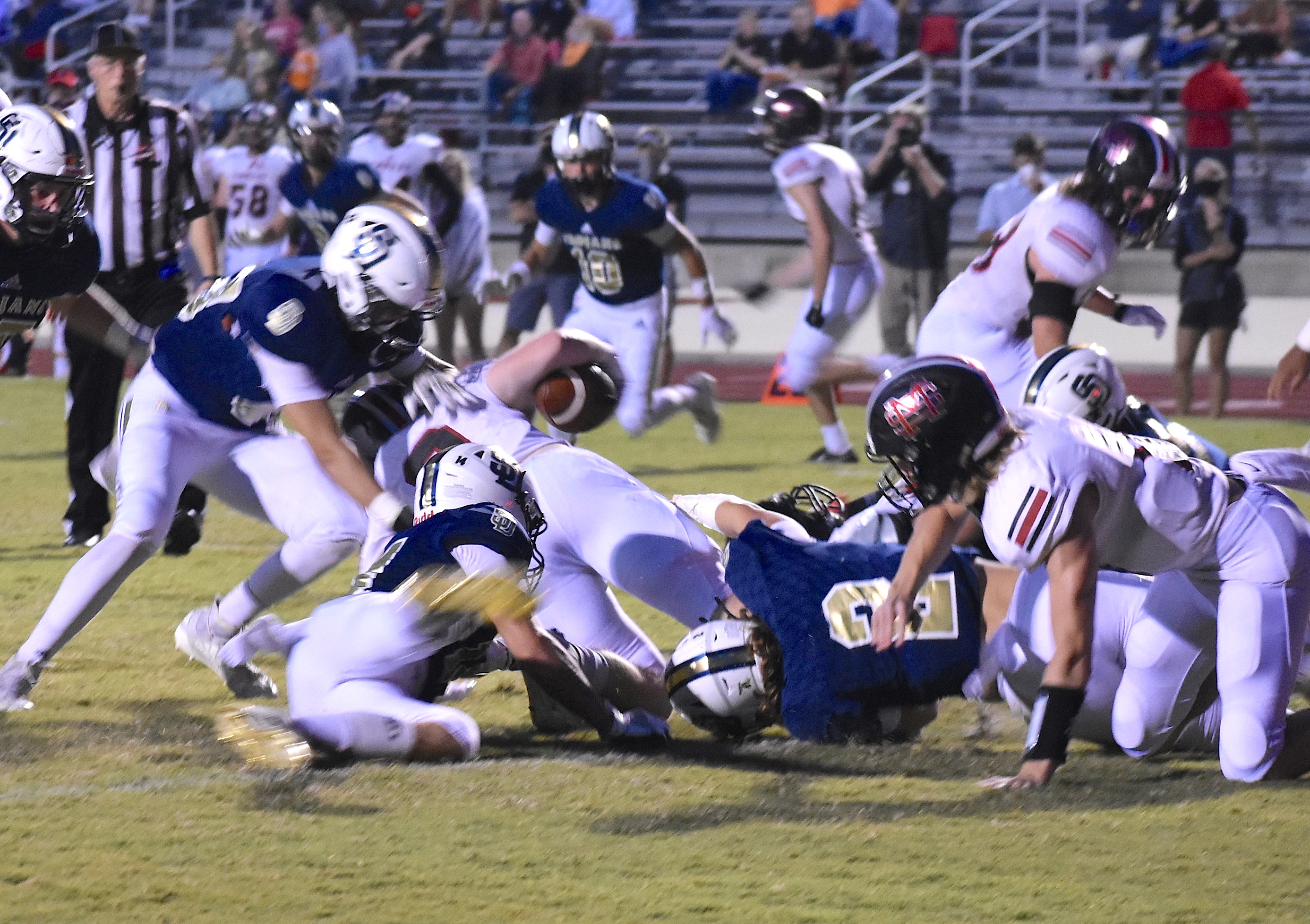 Staff photo by Patrick MacCoon / Soddy-Daisy linebacker Landon Lewis (2) brings down the ball carrier on the goal line in Thursday's 31-15 home victory for the Trojans.