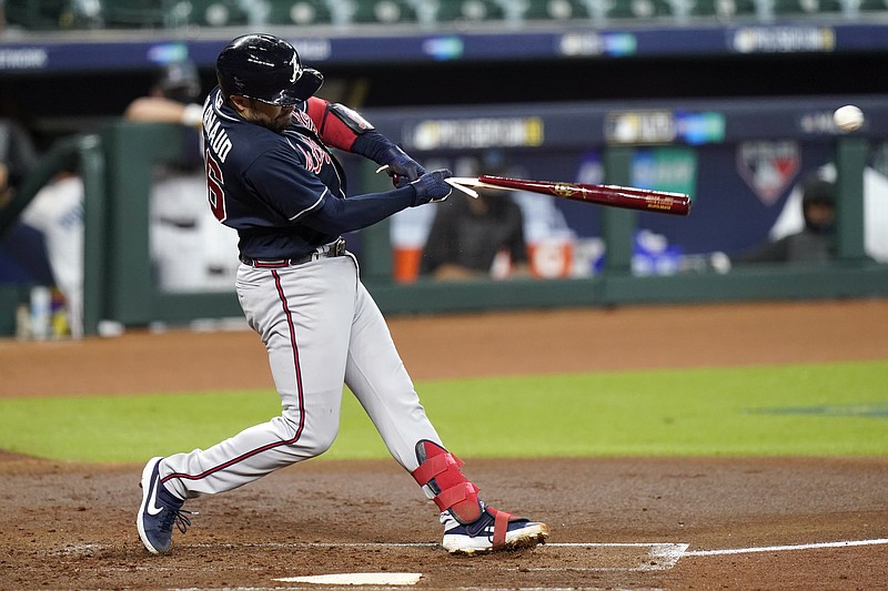 AP photo by Eric Gay / Atlanta catcher Travis d'Arnaud singles during the second inning of Game 3 of the Braves' NL Division Series against the Miami Marlins on Thursday in Houston.