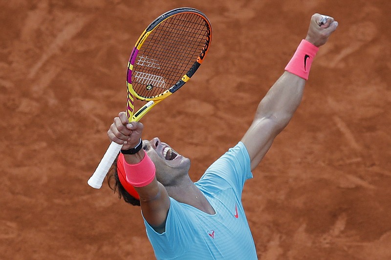 AP photo by Alessandra Tarantino / Rafael Nadal celebrates after beating Diego Schwartzman in the first French Open men's semifinal Friday in Paris. Nadal, who has won 13 of his 19 Grand Slam singles titles at the clay court major tournament, won 6-3, 6-3, 7-6 (0).