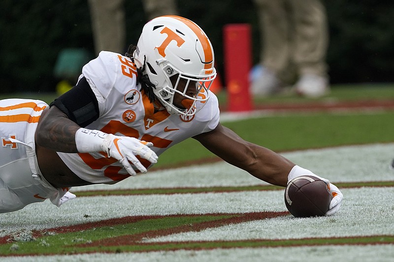 AP photo by John Bazemore / Tennessee linebacker Kivon Bennett recovers a Georgia fumble in the end zone for a touchdown early in Saturday's game in Athens, Ga.