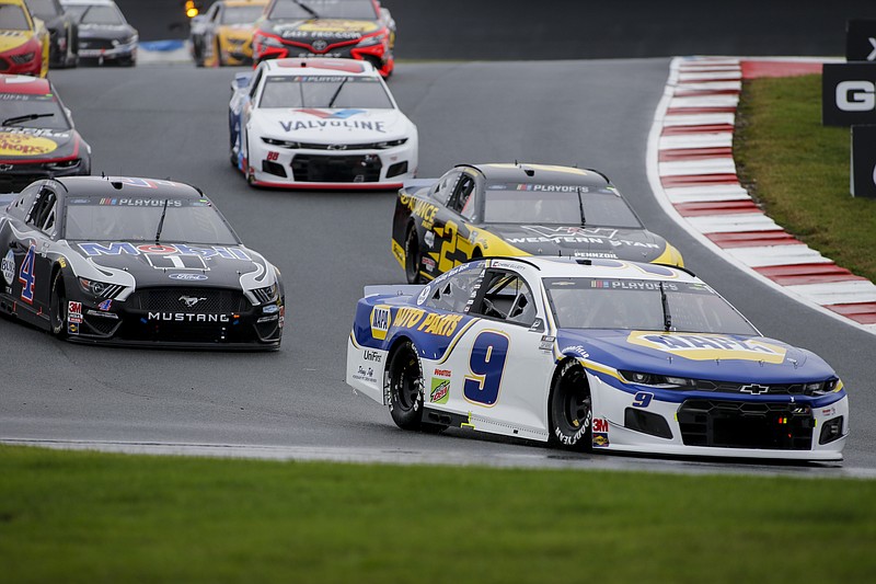AP photo by Nell Redmond / Chase Elliott (9) leads the way out of the seventh turn on the "Roval" course at Charlotte Motor Speedway during Sunday's NASCAR Cup Series playoff race in Concord, N.C. Elliott went on to win, extending a streak of NASCAR road course wins to four.