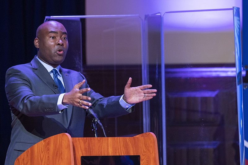 Democratic challenger Jaime Harrison speaks during the South Carolina U.S. Senate debate with Sen. Lindsey Graham, R-S.C., at Allen University in Columbia, S.C., Saturday, Oct. 3, 2020. (Joshua Boucher/The State via AP)