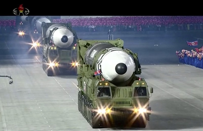 This image made from video broadcasted by North Korea's KRT, shows a military parade with what appears to be a possible new solid-fuel missile at the Kim Il Sung Square in Pyongyang, Saturday, Oct. 10, 2020. North Korean leader Kim Jong Un warned Saturday that his country would "fully mobilize" its nuclear force if threatened as he took center stage at a massive military parade to mark the 75th anniversary of the country's ruling party. (KRT via AP)