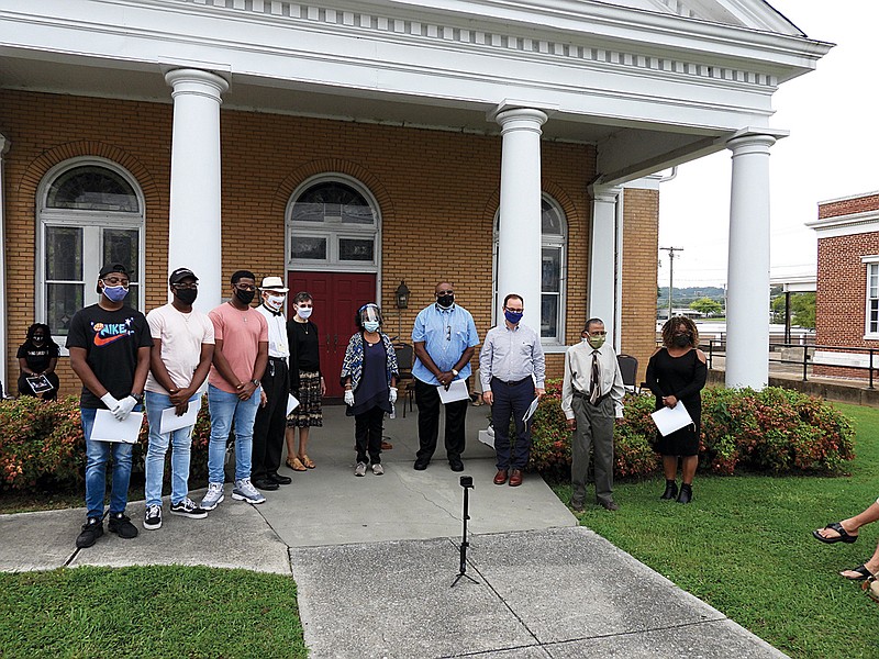 Photo contributed by David Boyle / Faith, government and community leaders gather for the dedication. Attendance was limited both as a precaution against COVID-19 and the potential for violence — though organizer Beverly Foster is quick to say such divisiveness does not characterize the local community. A video of the dedication can be viewed at tinyurl.com/WCMemorialOfReconciliation.