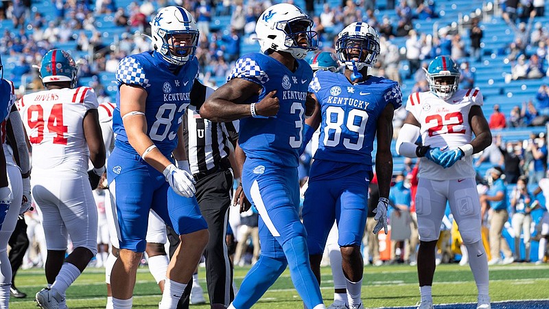 University of Kentucky photo / Kentucky senior quarterback Terry Wilson celebrates a touchdown during the 42-41 overtime loss to Ole Miss in Lexington on Oct. 3.