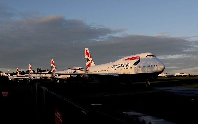 FILE - In this Sunday, Oct. 11, 2020 file photo, retired British Airways Boeing 747-400 parked at Cotsworld Airport in Kemble, England. British Airways said Monday Oct. 12, 2020, that CEO Alex Cruz has been replaced after 4 1/2 years on the job as the COVID-19 pandemic pummels airlines around the world. (AP Photo/Frank Augstein, File)