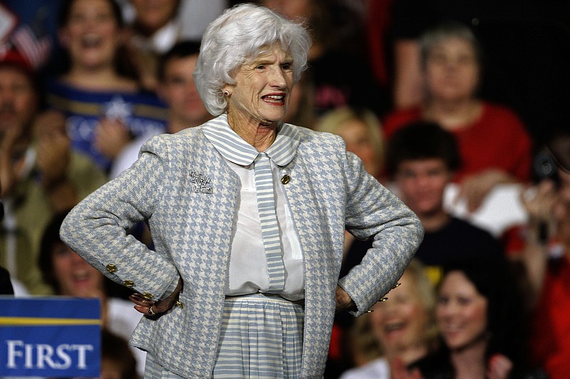 In this Oct. 16, 2008, file photo Roberta McCain, stands on stage during a rally in Downingtown, Pa. The mother of Arizona Sen. John McCain, Roberta McCain, has died. She was 108. A spokesperson for her daughter-in-law Cindy McCain says Roberta McCain died Monday, Oct. 12, 2020. A cause of death was not immediately released. Roberta McCain married into a storied military family, eloping with Navy ensign John McCain Jr., who eventually became a four-star admiral. (AP Photo/Carolyn Kaster, File)