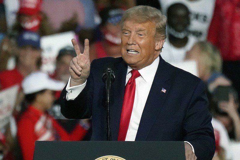 President Donald Trump speaks at a campaign rally at the Orlando Sanford International Airport Monday, Oct. 12, 2020, in Sanford, Fla. (AP Photo/John Raoux)