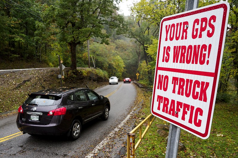 Staff photo by C.B. Schmelter / Vehicles drive along the W Road on Monday, Oct. 12, 2020 in Signal Mountain, Tenn.