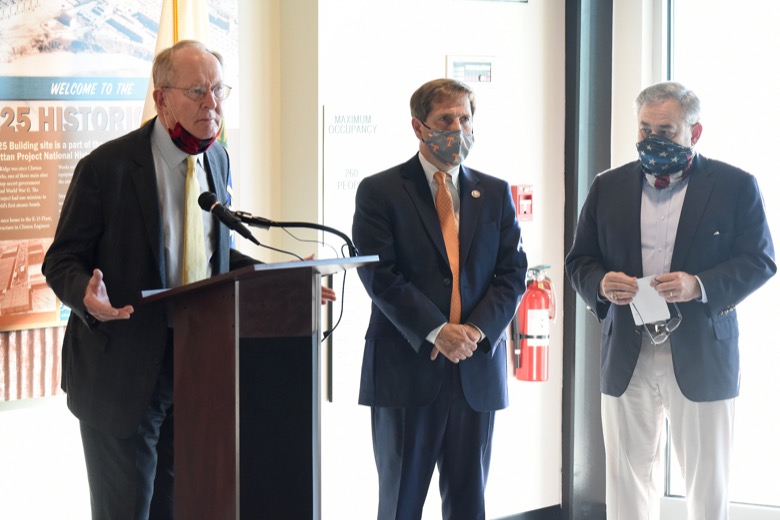 Staff Photo by Matt Hamilton / U.S. Senator Lamar Alexander speaks as Congressman Chuck Fleischmann and U.S. Secretary of the Department of Energy Dan Brouillette, right, look on at the K-25 History Center in Oak Ridge, Tenn. on Tuesday, Oct. 13, 2020.