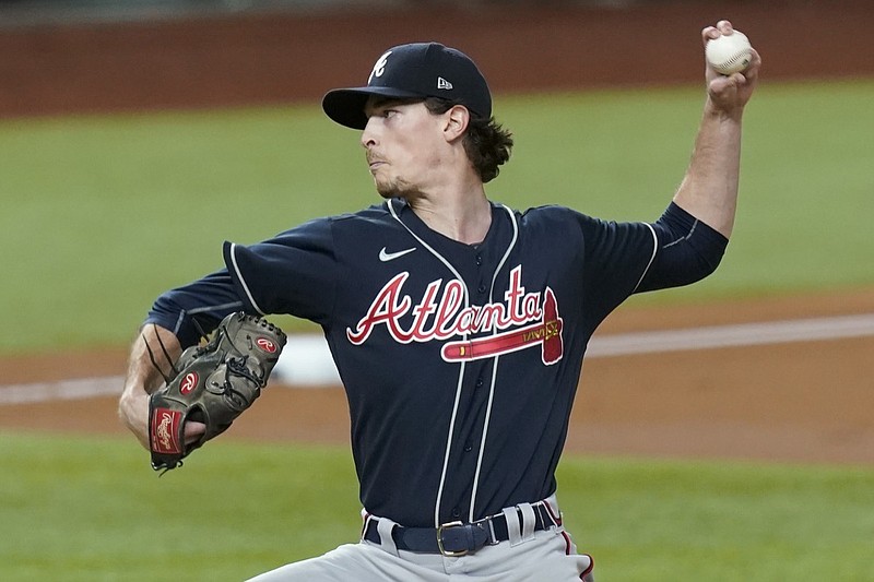 Atlanta Braves starting pitcher Max Fried throws against the Los Angeles Dodgers during the first inning in Game 1 of a baseball National League Championship Series Monday, Oct. 12, 2020, in Arlington, Texas.(AP Photo/Eric Gay)