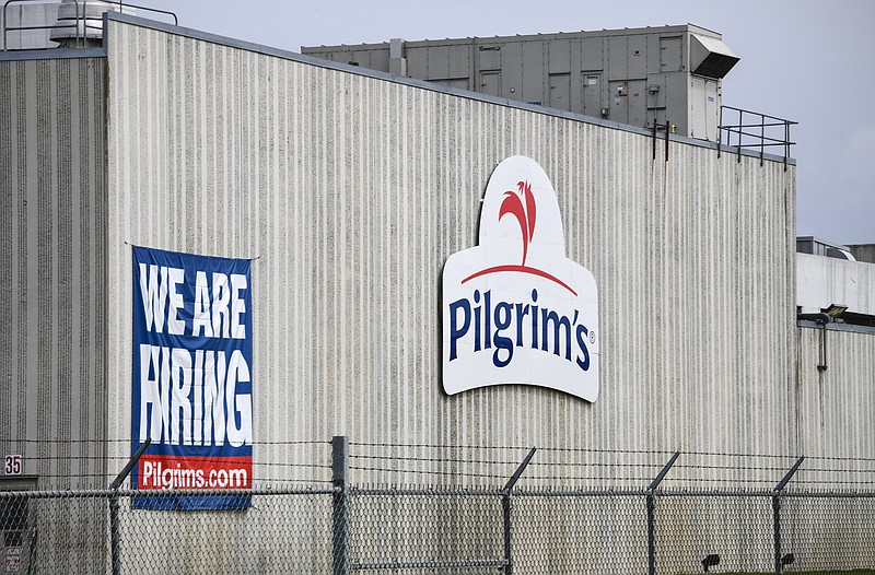 FILE - This April 28, 2020 file photo shows the Pilgrim's Pride plant in Cold Spring. Minn. Pilgrim's Pride Corp. has reached a plea agreement with the U.S. government, Wednesday, Oct. 14, over charges of price-fixing in the chicken industry. If a federal judge approves the agreement, Pilgrim's Pride would pay a fine of $110.5 million as a penalty for restraining competition. (Dave Schwarz/St. Cloud Times via AP)