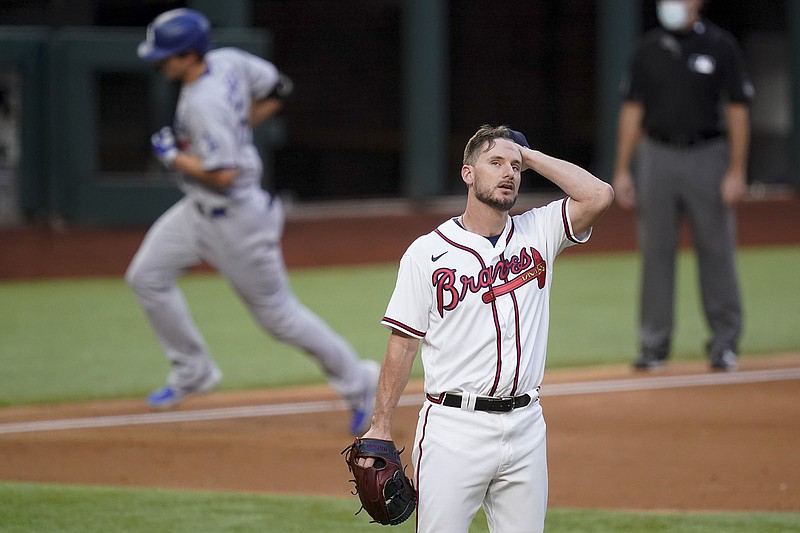 AP photo by Eric Gay / Atlanta Braves reliever Grant Dayton looks away after giving up a home run to the Los Angeles Dodgers' Corey Seager during the third inning of Game 3 of the NL Championship Series on Wednesday night in Arlington, Texas.