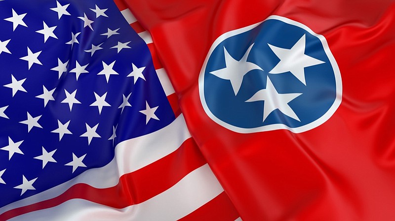 Close-up of USA flag with flag of Tennessee tennessee politics tile / Getty Images
