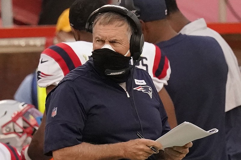 AP photo by Charlie Riedel / New England Patriots coach Bill Belichick's team is among those that have had to deal with schedule changes this season as a result of COVID-19.