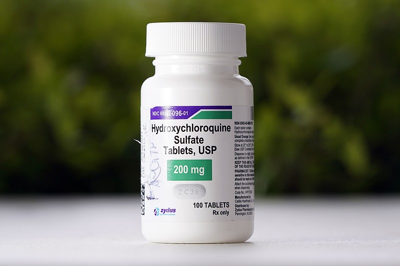This Tuesday, April 7, 2020, file photo shows a bottle of hydroxychloroquine tablets in Texas City, Texas. The U.N. health agency says the world's largest randomized trial of COVID-19 treatments found "conclusive evidence" that a repurposed malaria drug that U.S. authorities have made a pillar of treatment and President Donald Trump has touted has little or no effect on severe cases. The World Health Organization announced Friday, Oct. 16, 2020, the long-awaited results of its six-month "Solidarity Therapeutics Trial" that endeavored to see if existing drugs might have an effect on the coronavirus. (AP Photo/David J. Phillip, File)