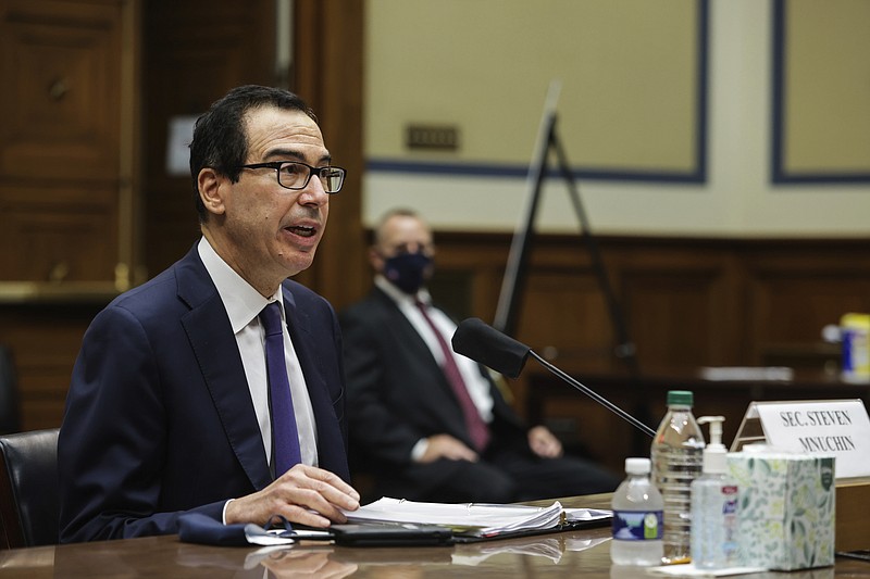 In this Sept. 1, 2020 file photo, Treasury Secretary Steven Mnuchin testifies before the House Select Subcommittee on the Coronavirus Crisis, during a hybrid hearing on Capitol Hill in Washington. The federal budget deficit hit an all-time high of $3.1 trillion in the 2020 budget year, more than double the previous record, as the coronavirus pandemic shrank revenues and sent spending soaring. The Trump administration reported Friday, Oct. 16, that the deficit for the budget year that ended on Sept. 30 was three times the size of last year's deficit of $984 billion. (Graeme Jennings/Pool via AP, File)