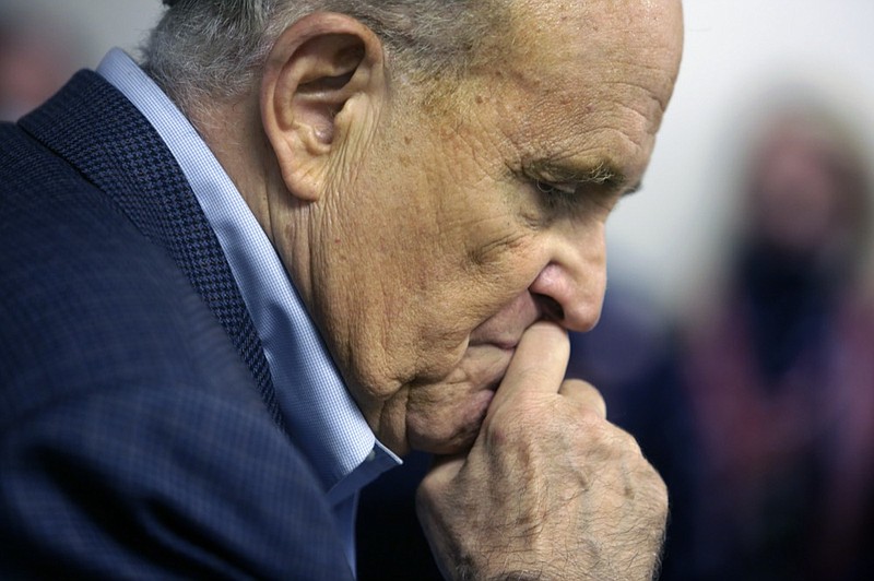 Former New York Mayor Rudy Giuliani pauses while addressing supporters of President Donald Trump Monday, Oct. 12, 2020 during a Columbus Day gathering at a Trump campaign field office in Philadelphia. (AP Photo/Jacqueline Larma)



