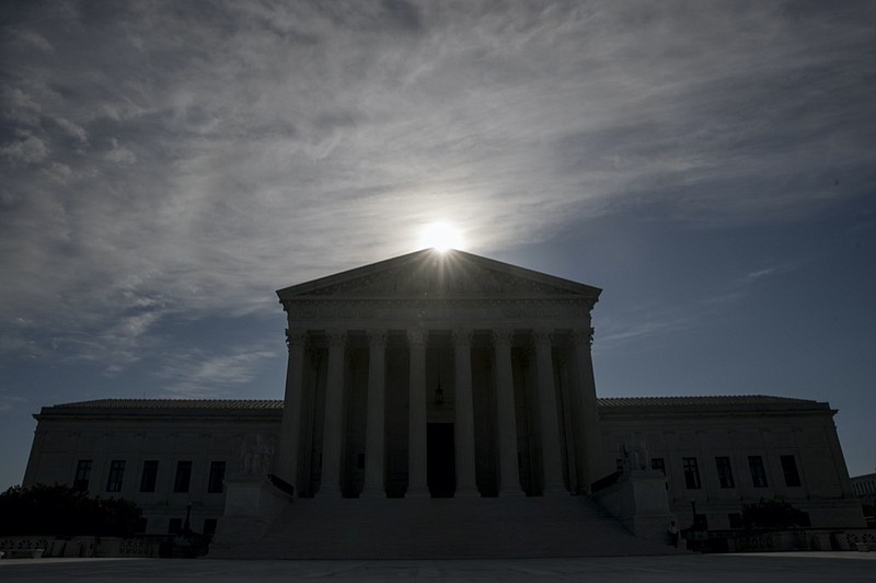 FILE - This May 4, 2020, file photo shows the Supreme Court building in Washington. Controversial Trump administration policies on the census, asylum seekers and the border wall, held illegal by lower courts, are on the Supreme Court's agenda Friday, Oct. 16, 2020. (AP Photo/Andrew Harnik, File)


