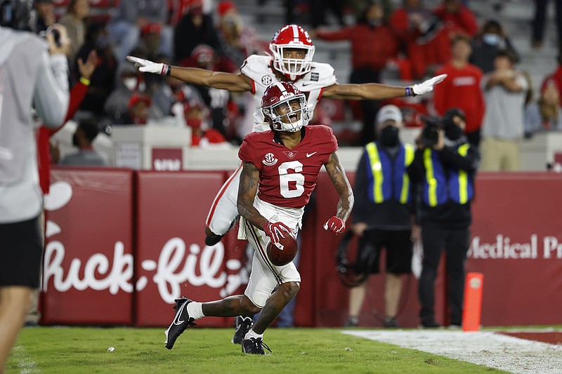 University of Alabama photo / Alabama receiver DeVonta Smith (6) had 11 catches for 167 yards and two touchdowns as the second-ranked Crimson Tide poured it on late for a 41-24 victory against No. 3 Georgia on Saturday night in Tuscaloosa.