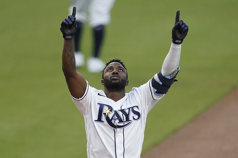 AP photo by Ashley Landis / The Tampa Bay Rays' Randy Arozarena celebrates after hitting a two-run homer against the Houston Astros during the first inning of Game 7 of the AL Championship Series on Saturday night in San Diego.
