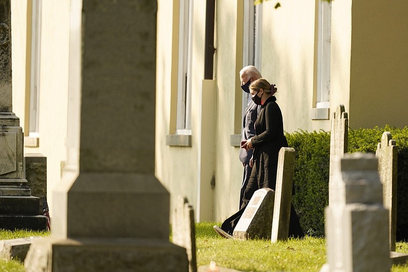 Democratic presidential candidate former Vice President Joe Biden and his granddaughter Finnegan Biden, leave mass at St. Joseph On the Brandywine Roman Catholic Church in Wilmington, Del., Sunday, Oct. 18, 2020. The Biden family walked to pay respects at his son Beau Biden's grave. (AP Photo/Carolyn Kaster)