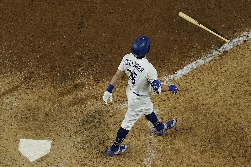 AP photo by David J. Phillip / The Los Angeles Dodgers' Cody Bellinger watches his home run against the Atlanta Braves during the seventh inning in Game 7 of the NL Championship Series on Sunday night in Arlington, Texas. Bellinger's homer made it 4-3, and the Dodgers made it hold up to earn their third World Series berth in four years.