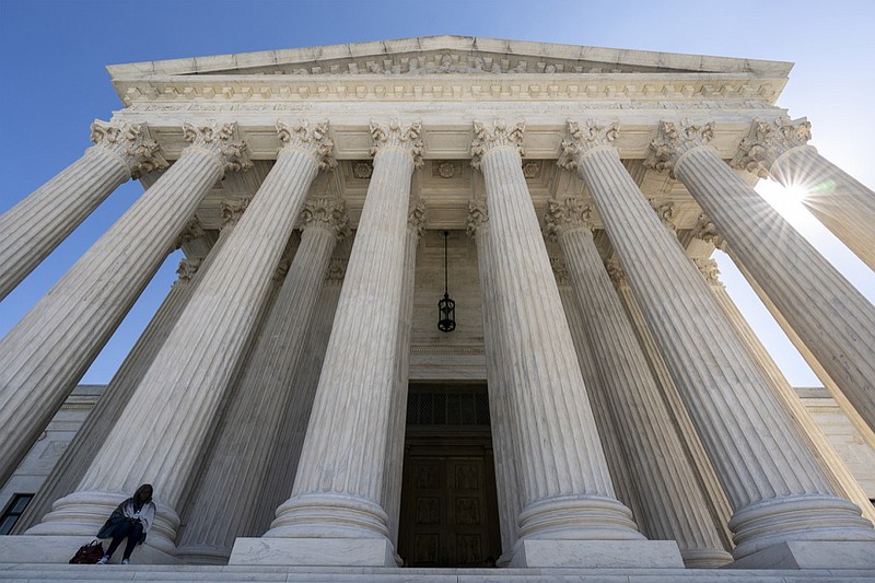 The Supreme Court is seen in Washington, Wednesday morning, Oct. 7, 2020. The Supreme Court is agreeing to review a Trump administration policy that makes asylum-seekers wait in Mexico for U.S. court hearings. As is typical, the court did not comment Monday in announcing it would hear the case. Because the court's calendar is already full through the end of the year, the justices will not hear the case until 2021. (AP Photo/J. Scott Applewhite)