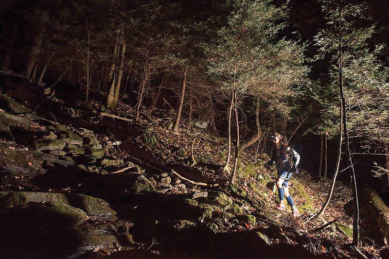 Contributed photo by Kent Peggram / A competitor carefully works his way uphill at the start of the inaugural Rock/Creek Stillhouse 100K in 2016.