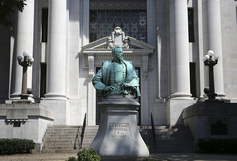 Staff photo by C.B. Schmelter / A bust of Confederate Gen. Alexander P. "Old A.P." Stewart is seen outside of the Hamilton County Courthouse on Aug. 16  in Chattanooga. The county commission is to consider a petition to remove the statue today.