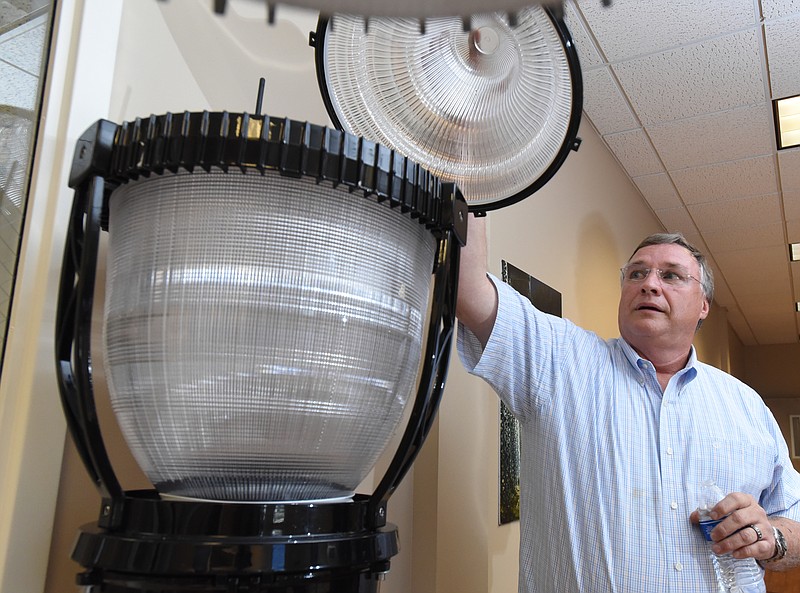 Staff photo by Angela Lewis Foster / Global Green Lighting President & CEO Don Lepard talks about his company's lights June 7, 2016.