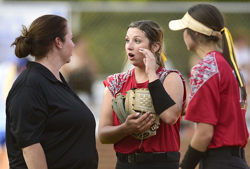 Sonoraville coach Natasha Hufstetler talks with Taylor Long and Kinsley Long between innings earlier in the season. / Staff photo by Robin Rudd