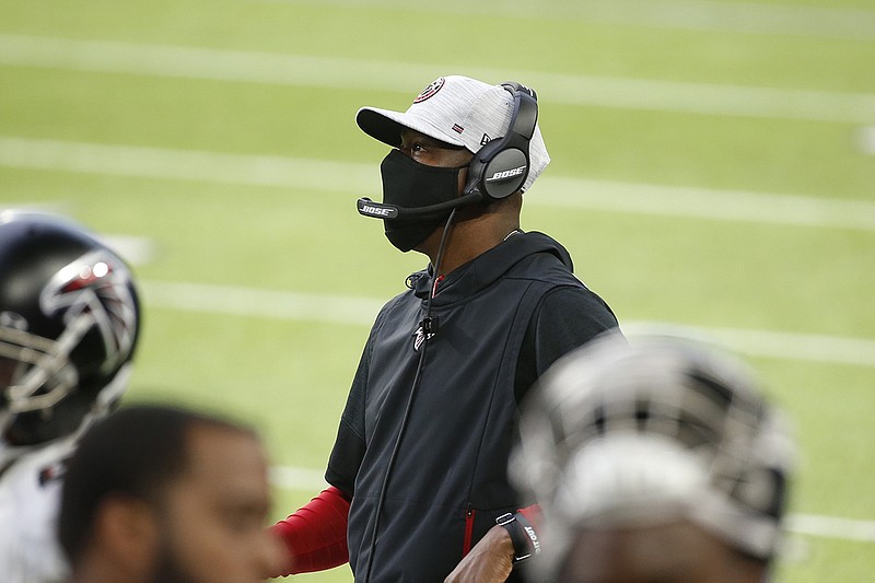 AP photo by Bruce Kluckhohn / Atlanta Falcons interim head coach Raheem Morris watches from the sideline during the first half of the team's 40-23 road win against the Minnesota Vikings this past Sunday. After an 0-5 start that led to the firing of coach Dan Quinn in his sixth season, Morris was given the reins on a temporary basis, though there is at least some chance he could retain the job if he performs well enough.