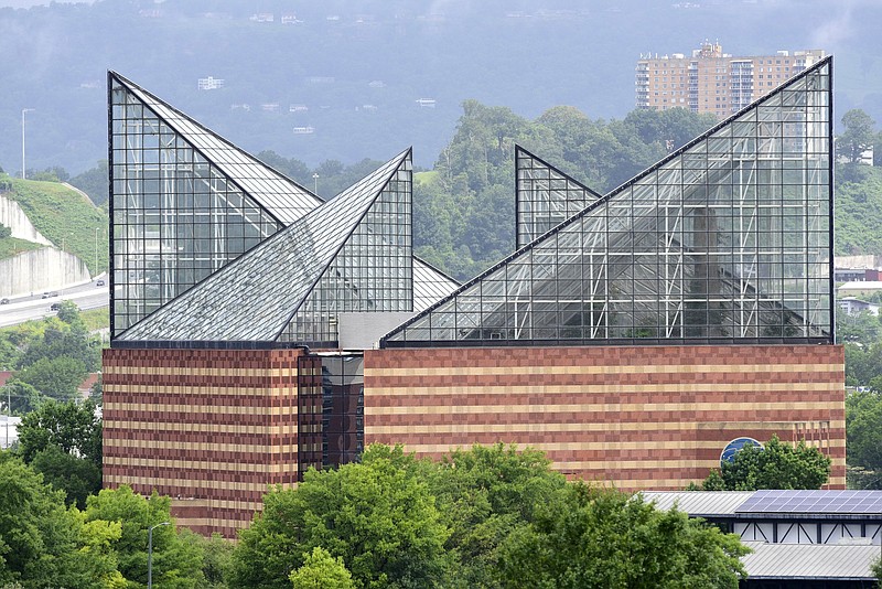 Staff Photo by Robin Rudd / The spires of the Tennessee Aquarium in June. The Aquarium laid off 22 full-time employees Thursday amid deep financial losses from the pandemic.