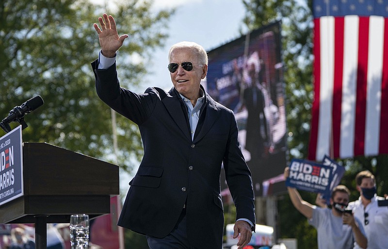 The New York Times photo by Ruth Fremson/Democratic presidential nominee Joe Biden waves to the crowd at a campaign event in Durham, N.C., last Sunday. Well over 400 prominent Republicans have spoken up to endorse Biden over their own party's sitting president, Donald Trump.