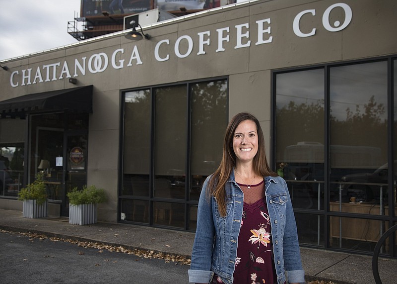Staff photo by Troy Stolt / Lisa Dunny, the new owner of Chattanooga Coffee Co. stands for a portrait outside of her new business on Wednesday, Oct. 21, 2020 in Chattanooga, Tenn. Dunny purchased Chattanooga Coffee Co. from Eileen Mason and Evelyn Wheeler at the beginning of October, and is also the owner the Spill the Beans Chattanooga.