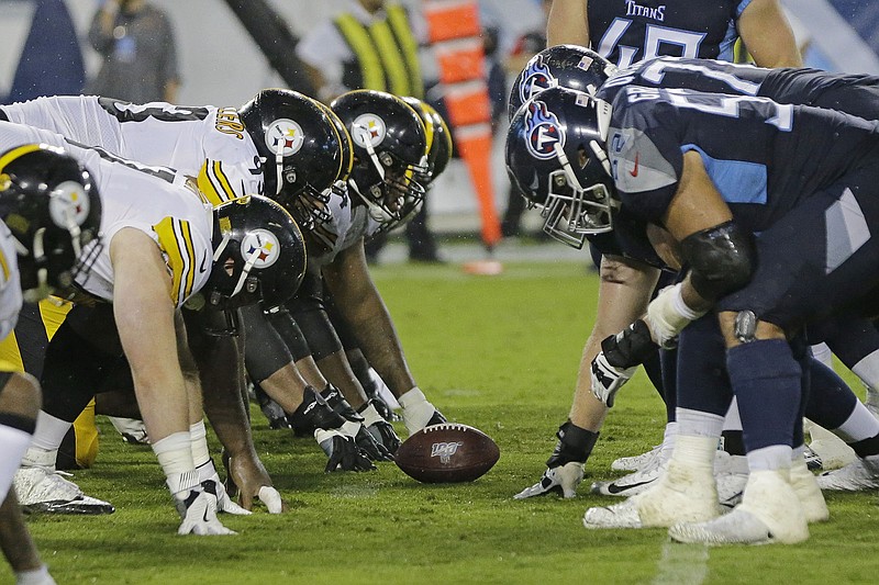 AP file photo by James Kenney / The Pittsburgh Steelers, left, and the Tennessee Titans meet Sunday in Nashville, a matchup of 5-0 teams that are the last undefeated clubs in the AFC this season.