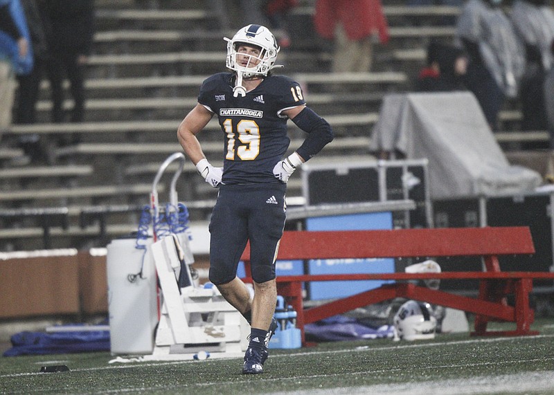 Staff photo by Troy Stolt / UTC wide receiver Bryce Nunnelly stands on the sideline after his kickoff return for a touchdown in the final two minutes of Saturday's game at Western Kentucky was called back.
