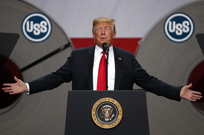FILE - In this July 26, 2018, file photo President Donald Trump speaks at the United States Steel Granite City Works plant in Granite City, Ill. Trump spent four years upending seven decades of American trade policy. He started a trade war with China, slammed America's closest allies by taxing their steel and aluminum and terrified Big Business by threatening to take a wrecking ball to $1.4 trillion in annual trade with Mexico and Canada. Trump's legacy on trade is likely to linger, regardless whether Joe Biden replaces him in the White House in January 2021. (AP Photo/Jeff Roberson, File)