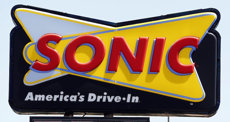 A Sonic drive-in beckons customers in Jackson, Miss., Thursday, June 13, 2019. (AP Photo/Rogelio V. Solis)