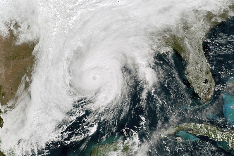 This GOES-16 GeoColor satellite image taken, Wednesday, Oct. 28, 2020, at 1 p.m. EDT, and provided by NOAA, shows Hurricane Zeta in the Gulf of Mexico nearing Louisiana. (NOAA via AP)